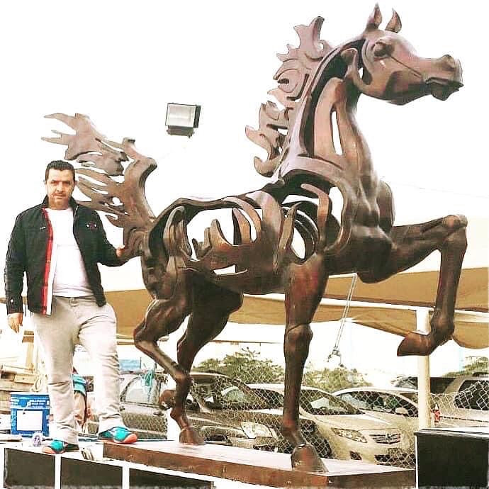 Bronze dancing horse sculpture with Arabic calligraphy by Iraqi artist Ahmed Allawi - Just Art Gallery Qatar