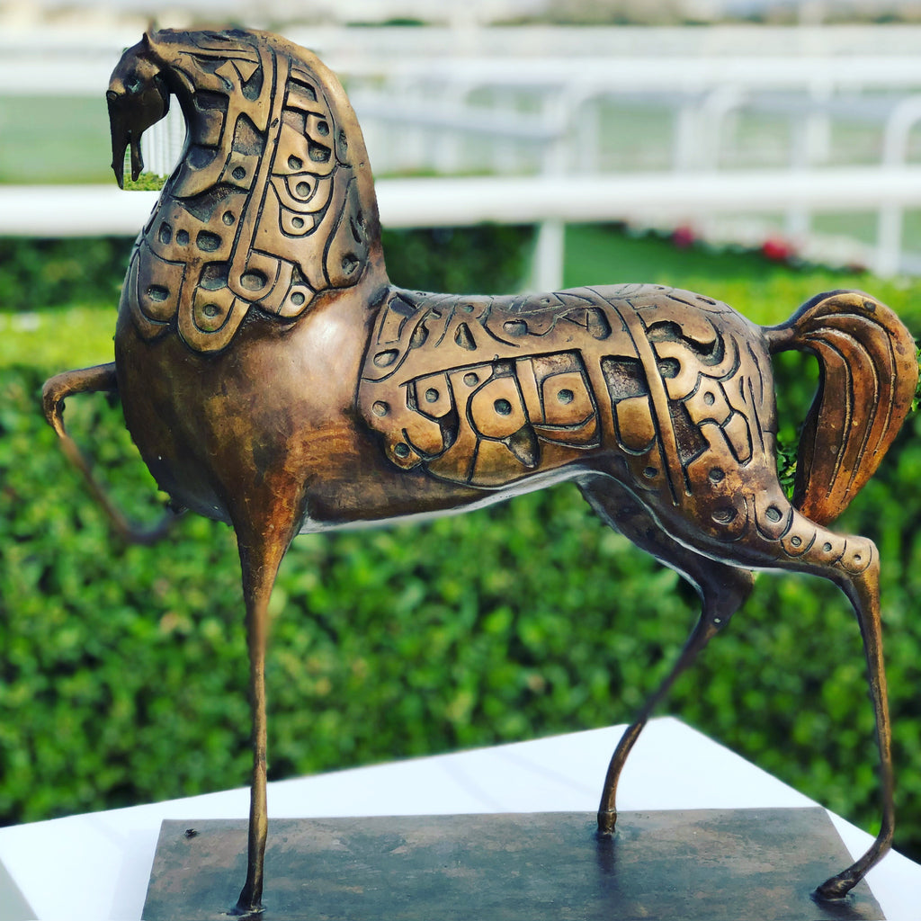 Bronze dancing horse sculpture with Arabic calligraphy by Iraqi artist Ahmed Allawi - Just Art Gallery Qatar